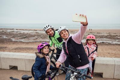 Family of four on a bike ride Family of four on a bike ride