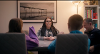 Sharen and Lee at table with two young people