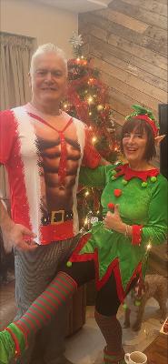 Foster carers Derek and Marie in Christmas themed fancy dress